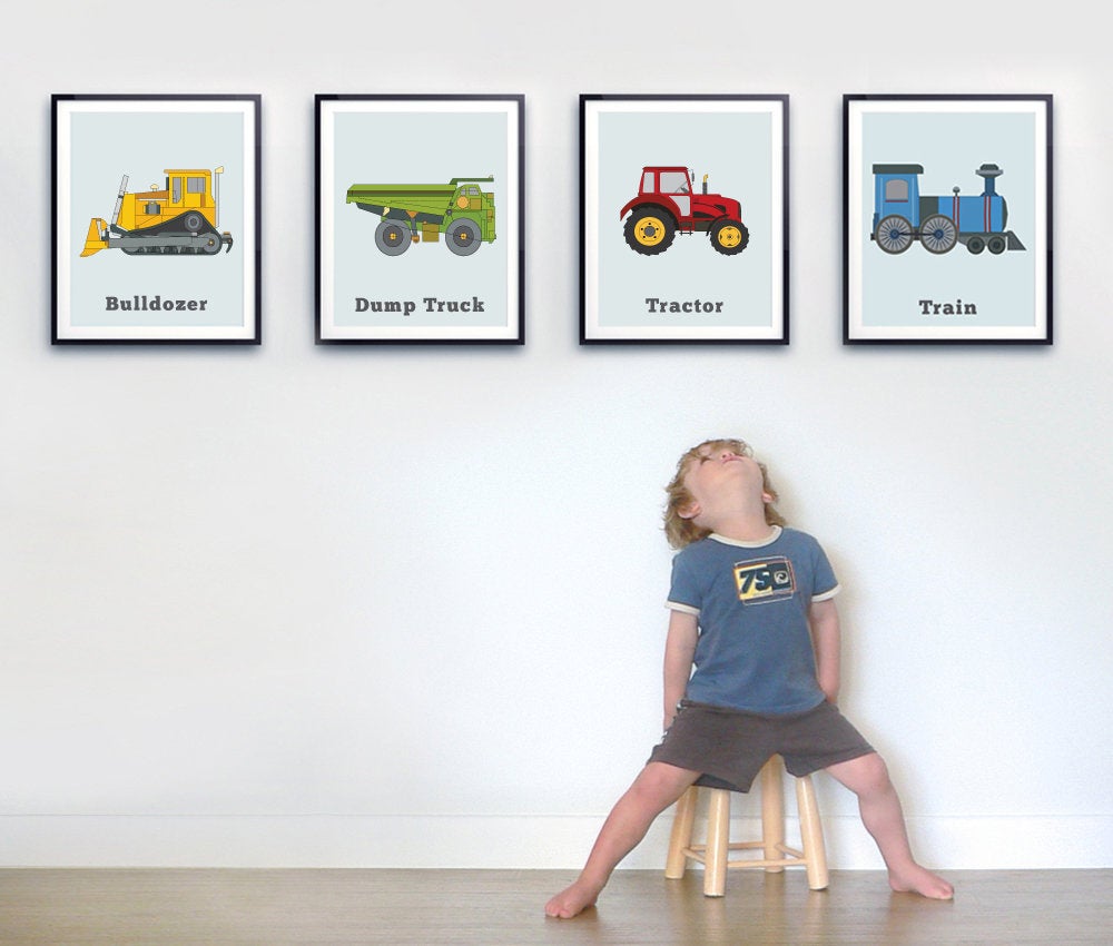 toddler boy with four truck prints